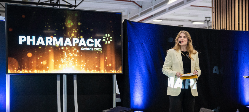 Female pharma professional on stage at Pharmapack awards