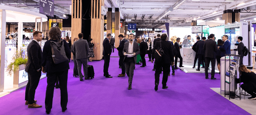 People in exhibition hall at Pharmapack